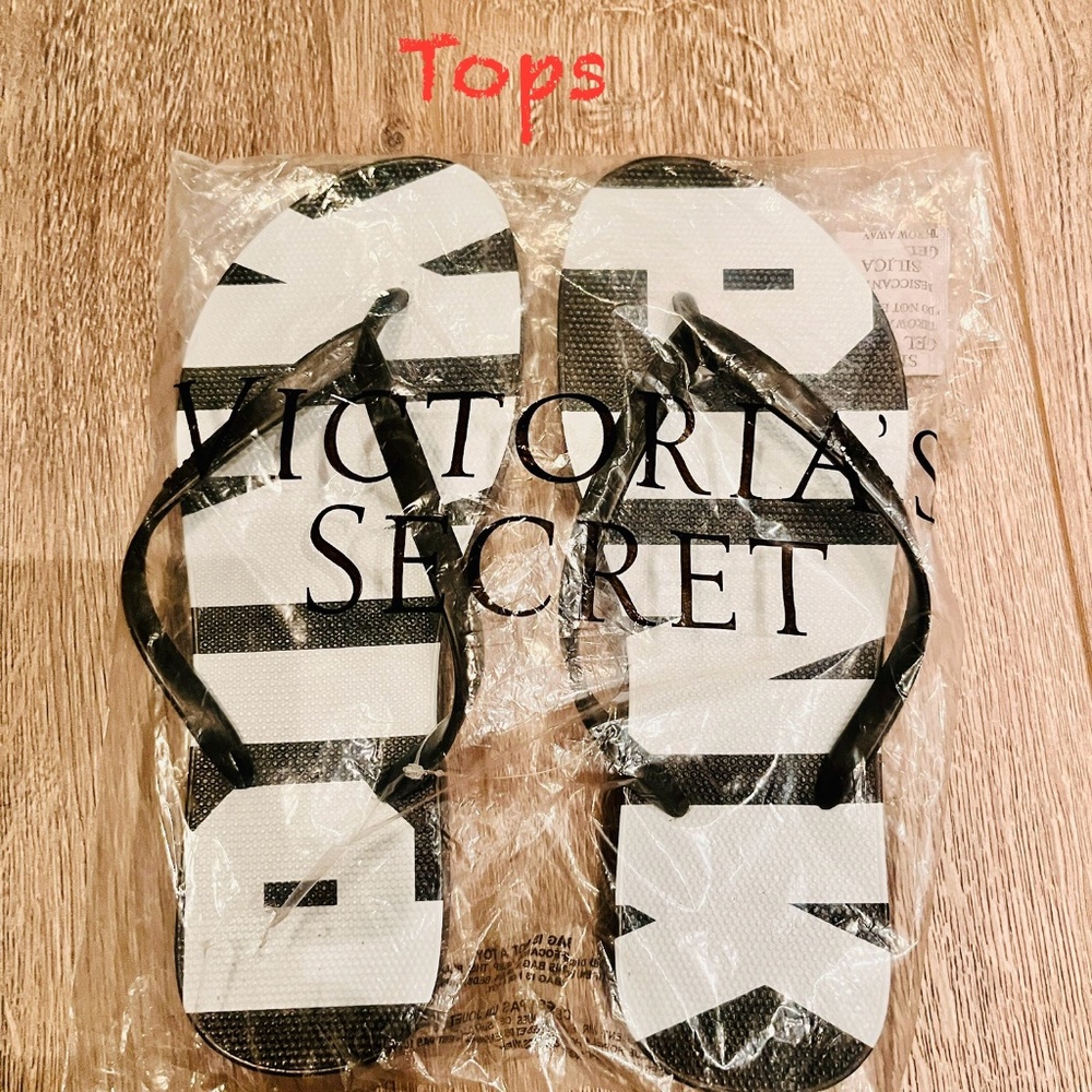 NEW IN PACKAGE Pink black & white flip-flops SZ: 8 1/2